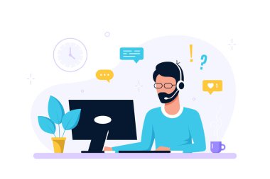 Dizüstü bilgisayarı ve mikrofonlu kulaklığı olan adam.