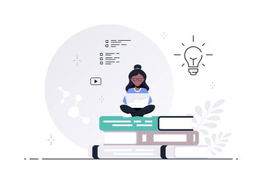 Dizüstü bilgisayarı olan kadın kitap yığınında oturuyor.