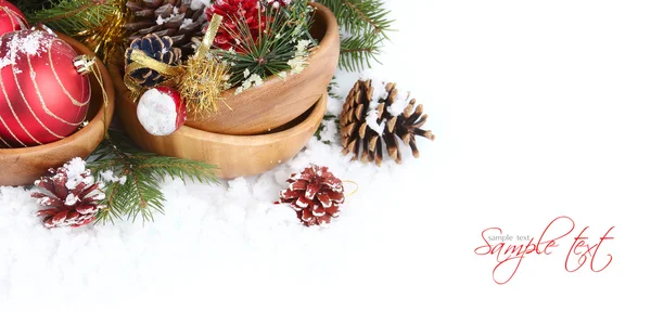 Christmas border with red bauble, golden present and snow — Stock Photo, Image