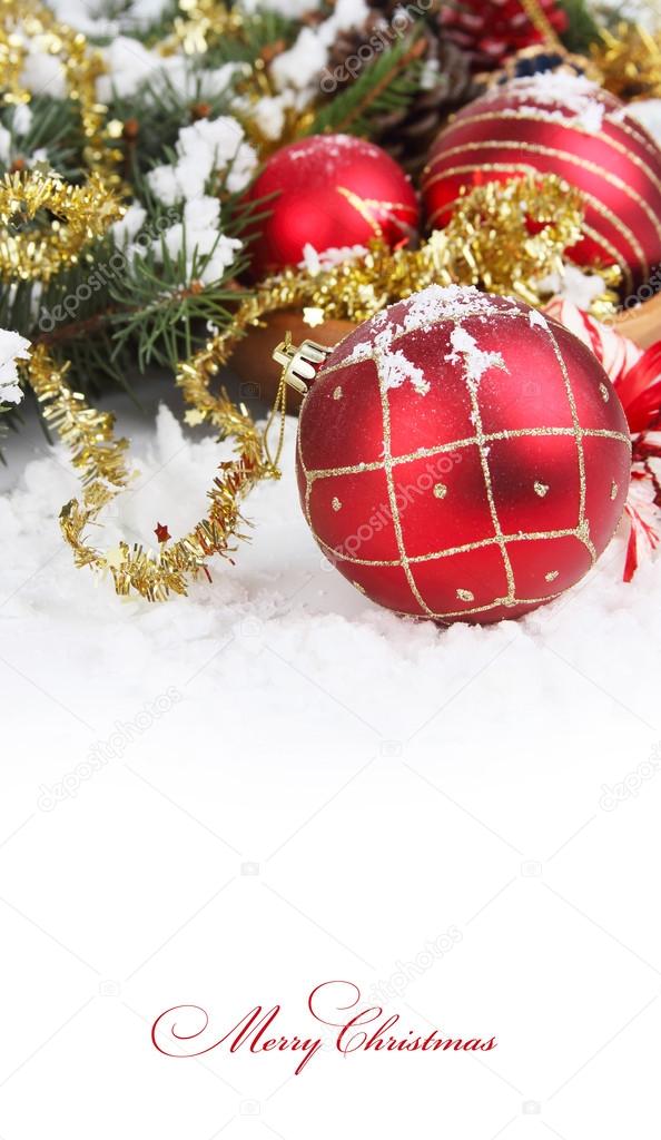 Christmas border with red bauble, golden present and snow