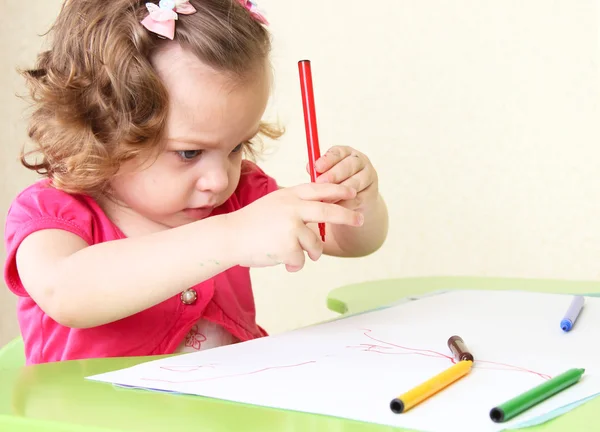 Little girl draws Stock Photo