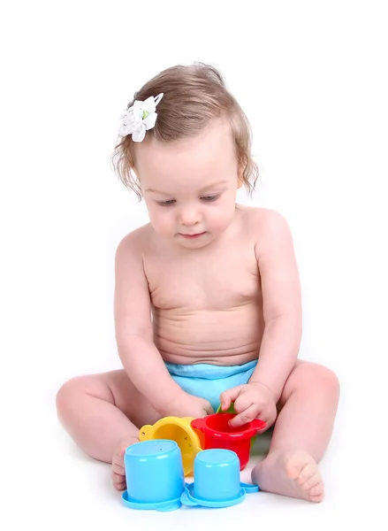 Baby is playing with educational toys — Stock Photo, Image