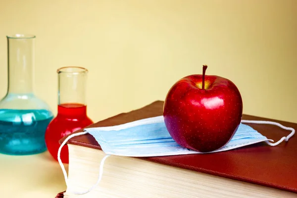 Chemistry class. Great chemistry textbook or medical reference book on a yellow background. Chocolate, student education.