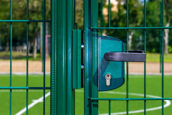 Steel door handle. Keyhole. Door lock. Outside. Protection.