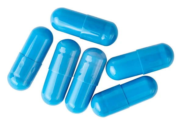 Beyaz arka planda mavi haplar. Tıbbi ilaçlar. Vitamin kapsülleri. Beyaz arkaplanda izole et.