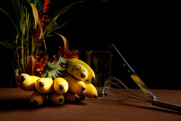 A bunch of fresh yellow banana on the table