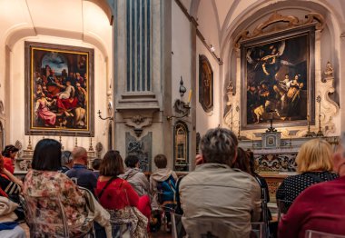 The Sette Opere Di Misericordia by Michelangelo Merisi da Caravaggio and San Pietro Che Resuscita Tabitha by Fabrizio Santafede in Pio Monte della Misericordia, Napoli, İtalya