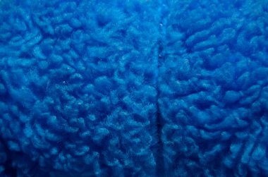 Mavi bir oyuncak ayının duvar kâğıdı. Yaklaş.