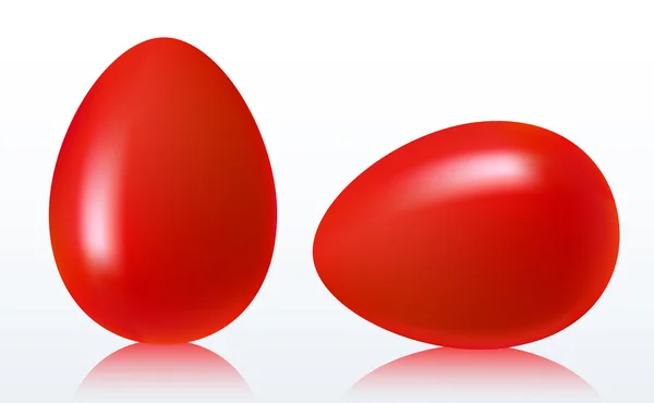 Dos huevos rojos de Pascua sobre un fondo blanco con reflejo — Archivo Imágenes Vectoriales