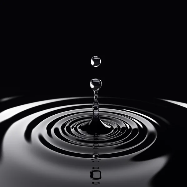 Water drop fell on the water surface — Stock Photo, Image