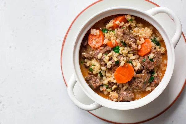 Homemade beef and barley soup. White background. Top view. Copy space. — Stock Image Homemade Beef Barley Soup White Background Top View Copy Space Stock Picture