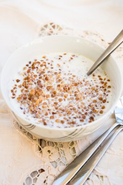 Table set for Breakfast. Buckwheat Porridge