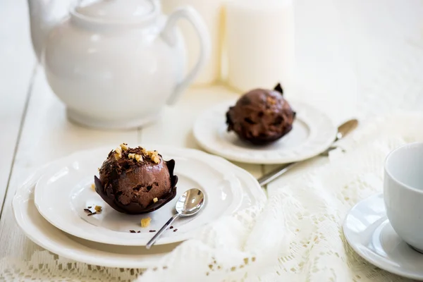 Chocolate Ice Cream Scoop is laying on Chocolate Homemade Bow — Stock Photo, Image