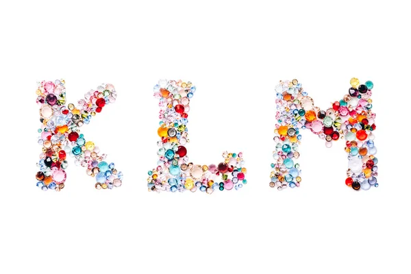 Буквы KLM из стеклянных ярких гем — стоковое фото