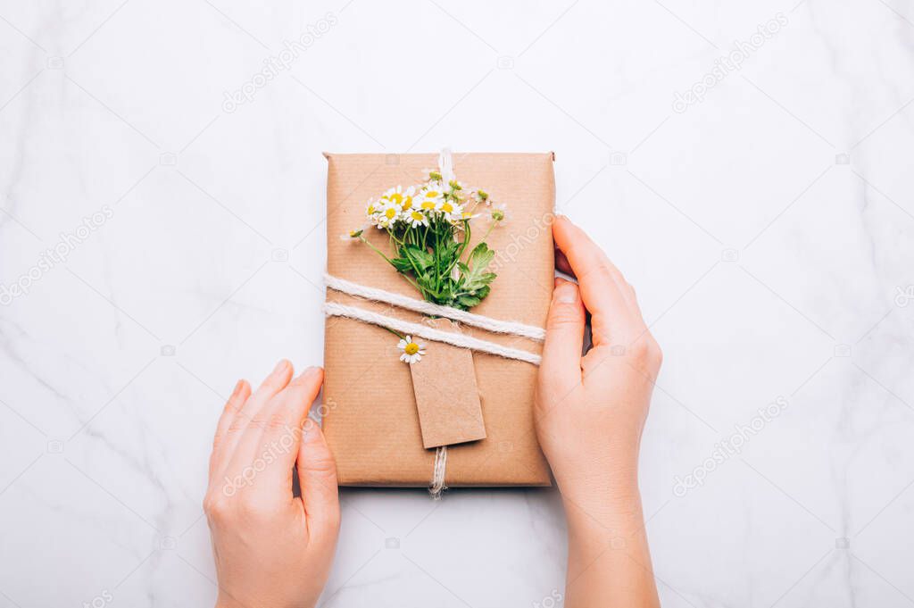Eco friendly gift wrapped in brown paper