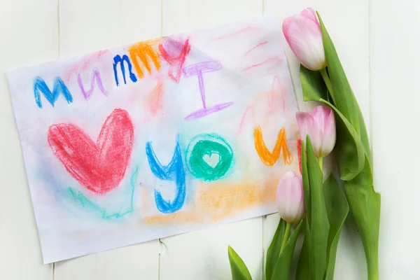 Drawing from Child for Mummy with Tulips nearby — Stock Photo, Image
