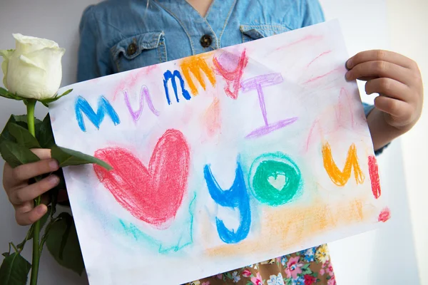 Little Girl is holding her Drawing for Mummy — Stock Photo, Image