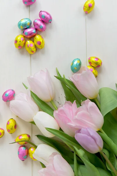 Bunch of Tulips and Chocolate Easter Eggs — Stock Photo, Image