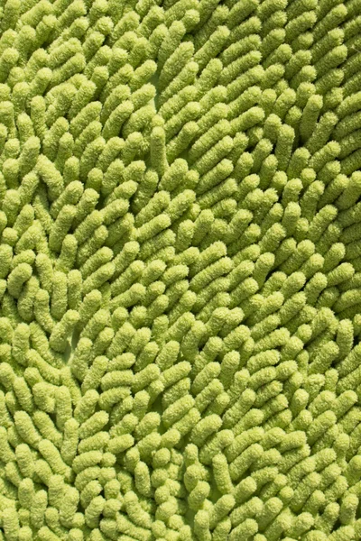 Vacker bakgrund grön matta fiber. — Stockfoto