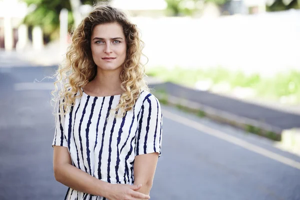 Woman wearing striped dress — Stock Photo, Image