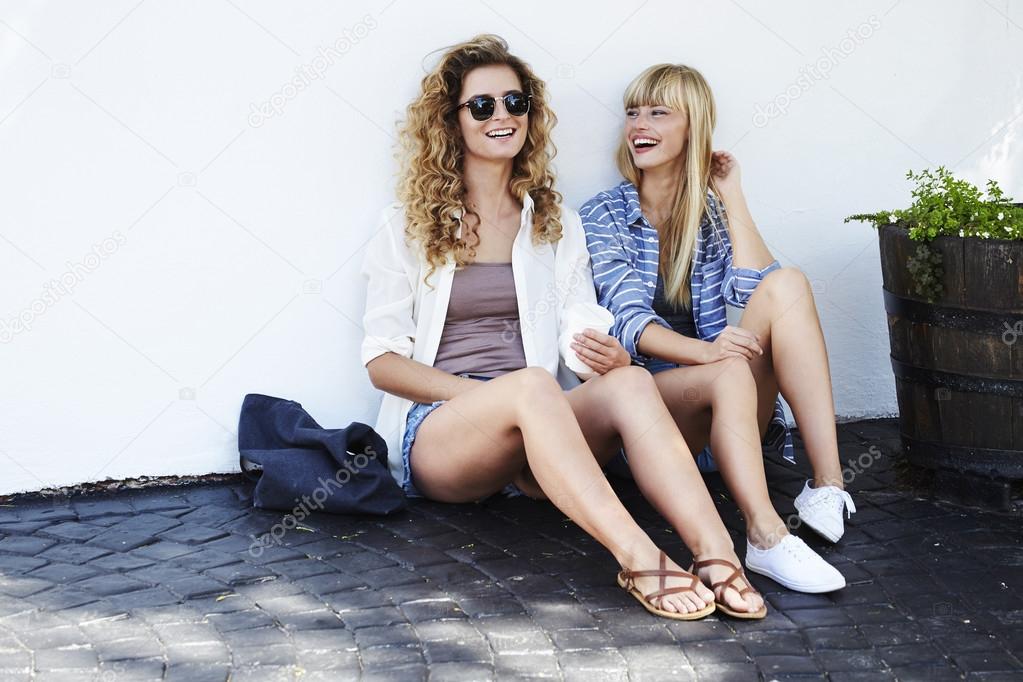 Gorgeous girlfriends laughing