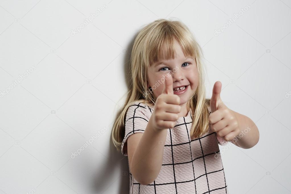 Thumbs up from little girl