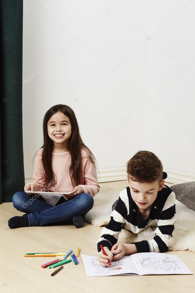 young friends with tablet