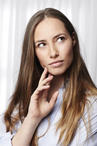 Thoughtful young woman — Stock Photo, Image