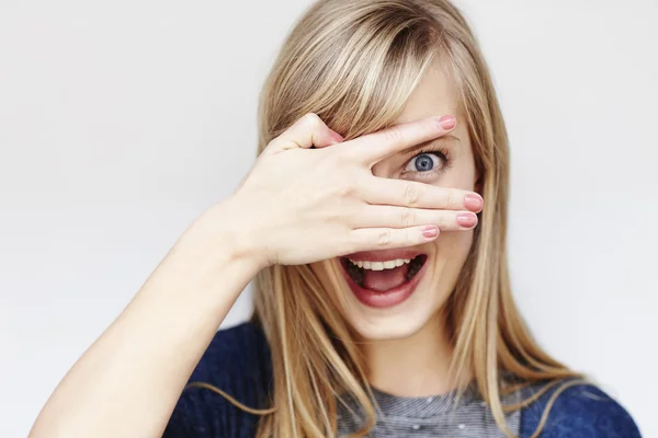 Surprised young blond woman — Stock Photo, Image