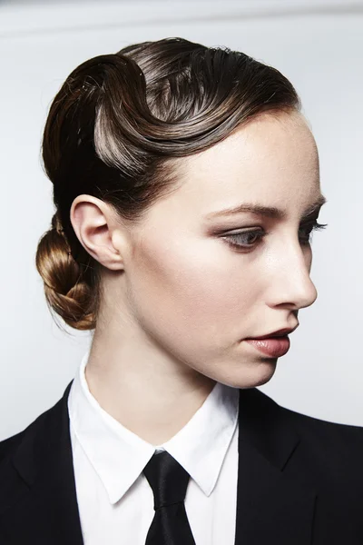 Brunette businesswoman looking away — Stock Photo, Image