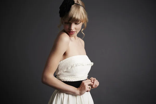 Fashion bride in gray studio — Stock Photo, Image