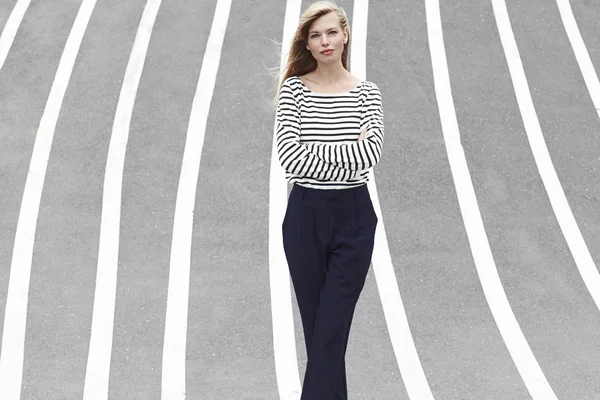 Confident girl in striped clothing — Stock Photo, Image