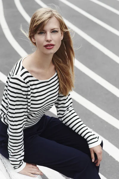 Gorgeous woman in striped top — Stock Photo, Image