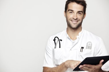 Doctor holding tablet