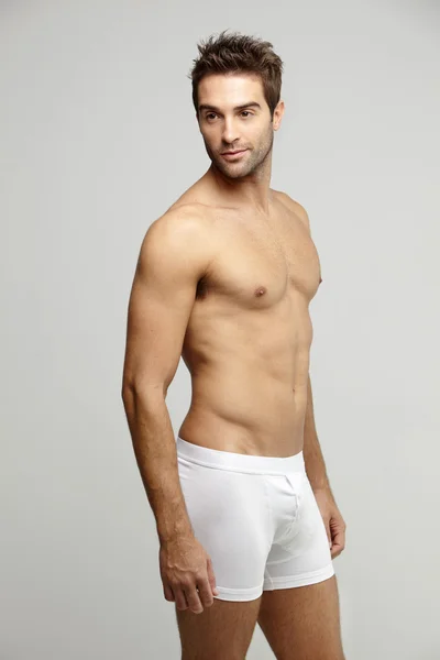 Man in underpants looking away — Stock Photo, Image