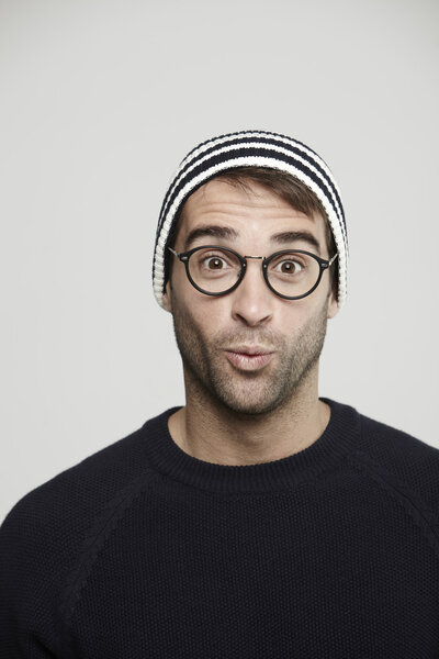 Surprised mid adult man