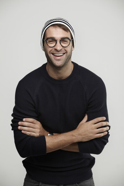 Man in glasses smiling