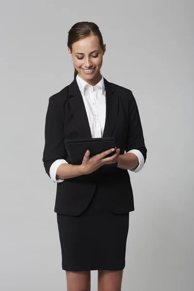 Businesswoman using digital tablet — Stock Photo, Image