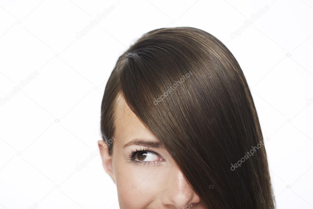 Woman with hair covering face