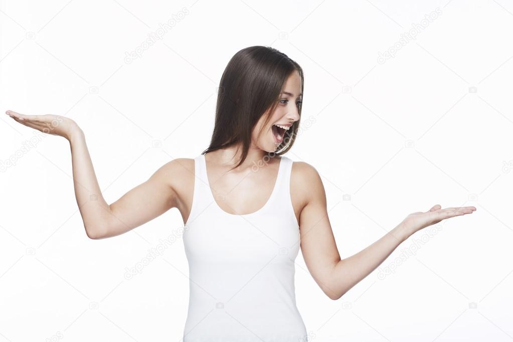 Young woman with arms out