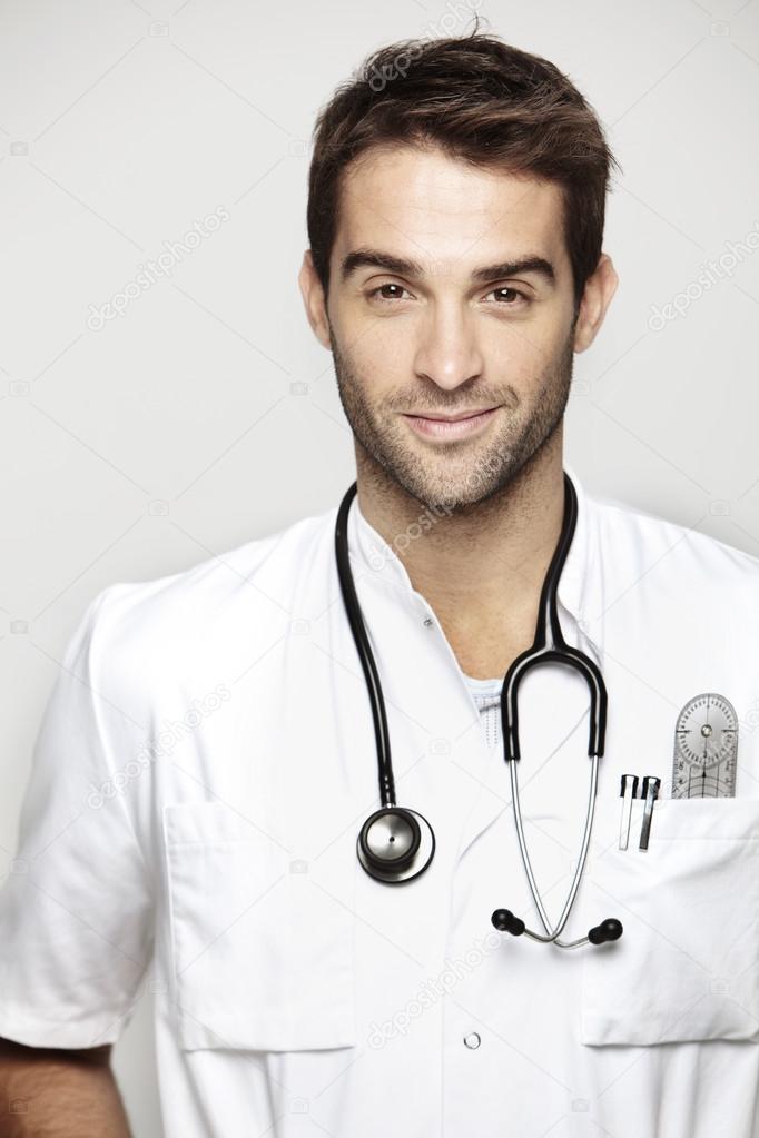 doctor wearing stethoscope posing