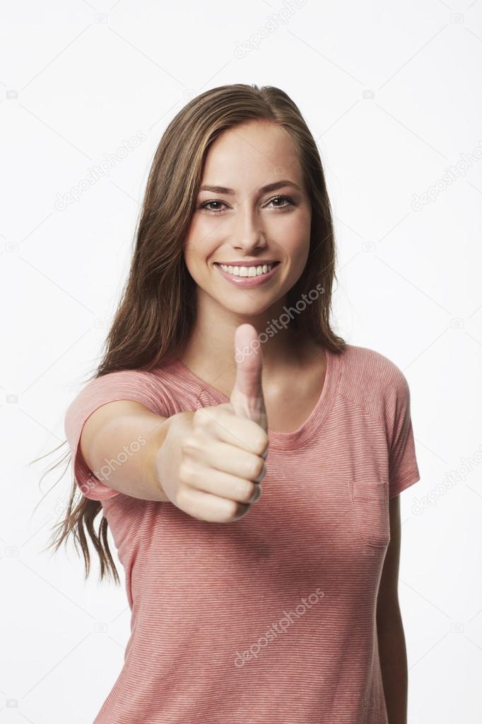 young woman with thumb up