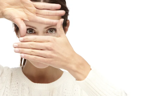 Vrouw haar gezicht inlijsten — Stockfoto