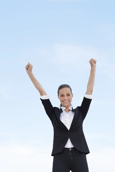 Businesswoman with arms up — Stock Photo, Image