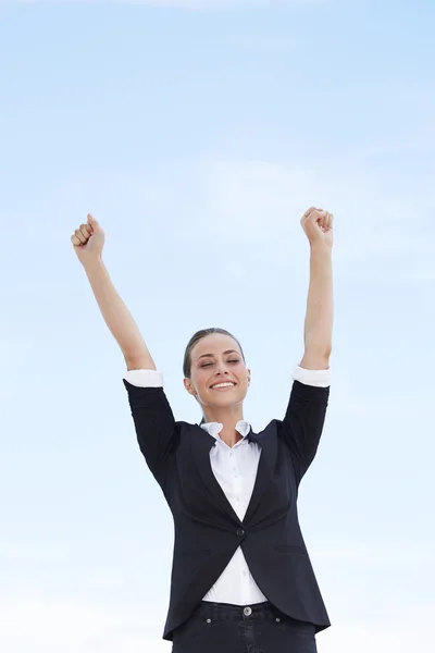 Businesswoman with arms up — Stock Photo, Image