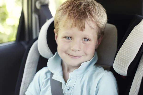 Boy in child's car sea — Stock Photo, Image