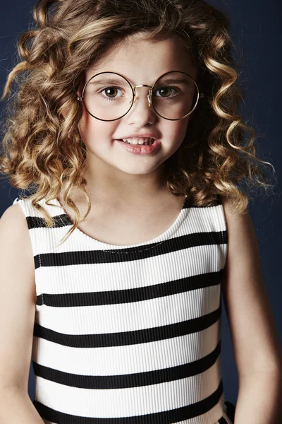 Young girl in glasses and dress — Stock Photo, Image