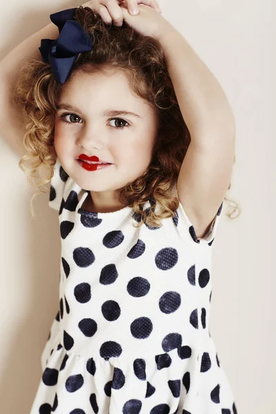 Girl in lipstick and polka dots — Stock Photo, Image