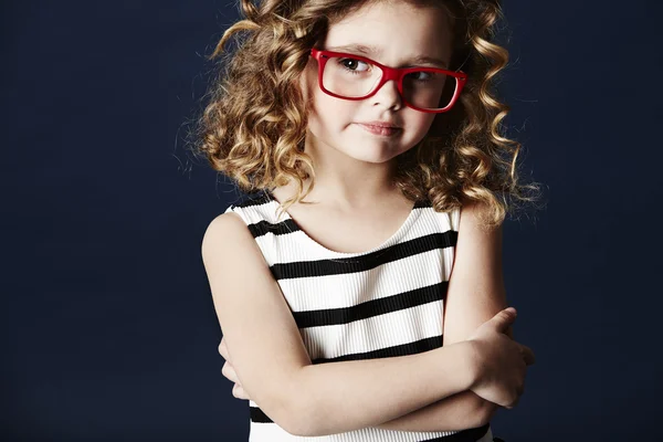 Girl thinking in spectacles — Stock Photo, Image