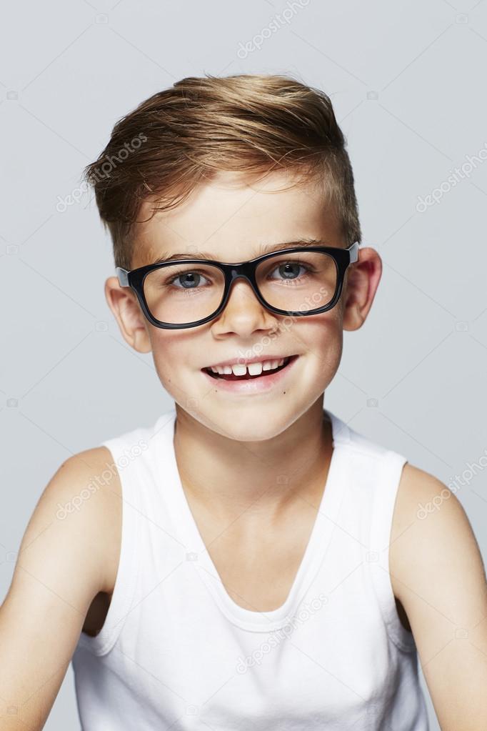 Young boy wearing glasses